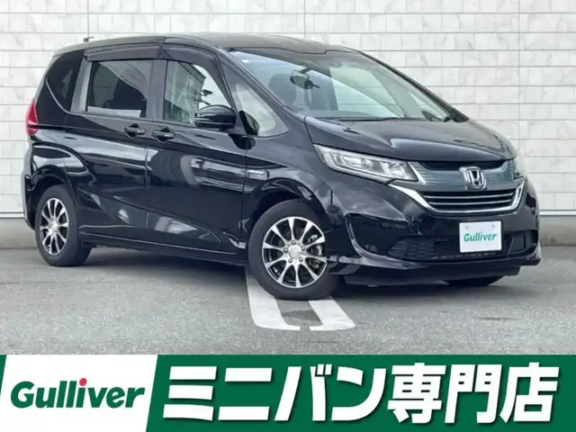 ホンダ フリード ハイブリット G ホンダセンシング 福岡県 2018(平30)年 5.8万km プレミアムスパークルブラックパール 社外7型SDナビ(フルセグTV/CD/DVD/BT)バックモニタホンダセンシング両側電動パワスラレーダークルコンETC純正LEDヘッドライトプッシュスタートスマートキー