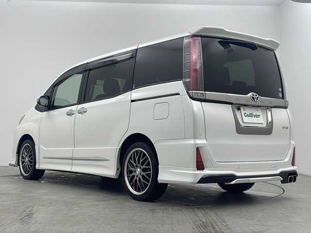 トヨタ ノア Si ダブルバイビーⅡ 大阪府 2020(令2)年 3.1万km ホワイトパールクリスタルシャイン 禁煙車/純正１０インチナビ/・Bluetooth・フルセグ・CD/DVD・SD・AM/FM/両側パワースライドドア/純正１２．１インチフリップダウン/トヨタセーフティセンス/・プリクラッシュセーフティシステム・LDA・PKSB/・クリアランスソナー・先行車発進お知らせ機能/前後コーナーセンサー/前後ドラレコ/モデリスタエアロ/Ｂカメラ/クルーズコントロール/MTモード付ATシフト/AUTOライト/オートマチックハイビーム/ビルドインETC2.0/ハーフレザーシート/LEDヘッドライト