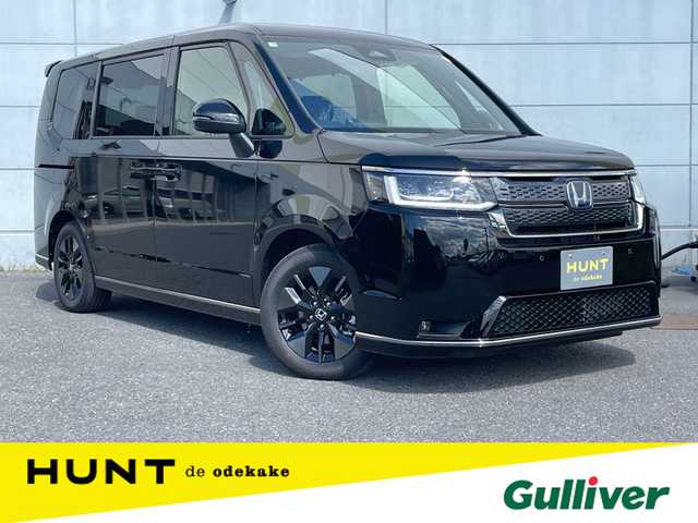 ホンダ ステップワゴン スパーダ eHEV 千葉県 2025(令7)年 0.1千km クリスタルブラックパール 登録済未使用車/・登録時走行距離７km/ホンダセンシング/・衝突軽減ブレーキ/レーンキープアシスト/・レーダークルーズコントロール/オートハイビーム/・ブラインドスポットモニター/クリアランスソナー/11.4インチナビHonda CONNECTナビ/・フルセグ/BT/DVD/CD/USB/カープレイ/バックカメラ/ステアリングスイッチ/パドルシフト/ハーフレザーシート/シートヒーター(D/N席)/両側パワースライドドア/パワーバックドア/LEDヘッドライト/オートライト/フォグライト/スマートキー/プッシュスタート/純正16インチAW