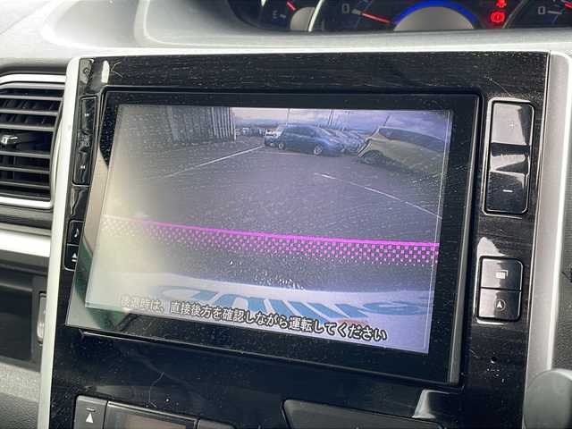 ダイハツ タント カスタム RS SA 新潟県 2015(平27)年 9.5万km タングステングレーM 4WD/純正メモリナビ/（BT/FM/AM）/バックカメラ/ハーフレザーシート/両側パワースライドドア/純正アルミホイール/ドアバイザー/冬タイヤ積載/ETC