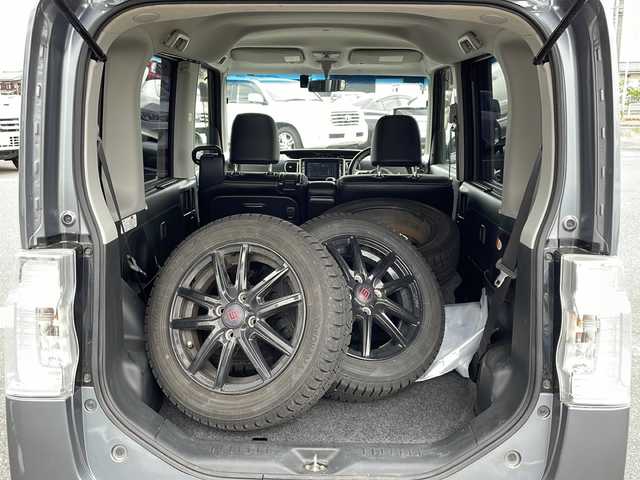 ダイハツ タント カスタム RS SA 新潟県 2015(平27)年 9.5万km タングステングレーM 4WD/純正メモリナビ/（BT/FM/AM）/バックカメラ/ハーフレザーシート/両側パワースライドドア/純正アルミホイール/ドアバイザー/冬タイヤ積載/ETC