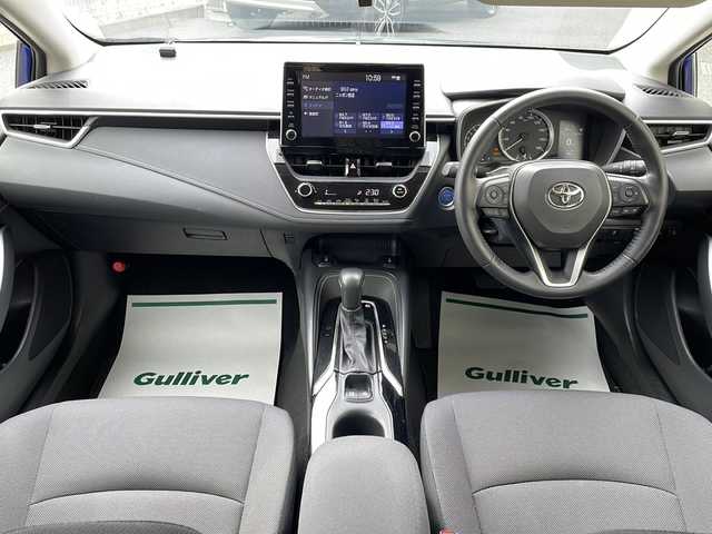 トヨタ カローラツーリング ハイブリッド S 神奈川県 2022(令4)年 1.6万km ライトブルーM 純正ナビ（AM/FM/USB/BT/Miracast)/バックカメラ/前後ドラレコ/ビルトインETC2.0/レーダークルコン/D/N席シートヒーター/ステアリングヒーター/オートハイビーム/ブレーキホールド/ABS/横滑り防止装置/レーンキープアシスト/アイドリングストップ/プッシュスタート/純正AW/純正フロアマット/純正ドアバイザー/保証書/取扱説明書