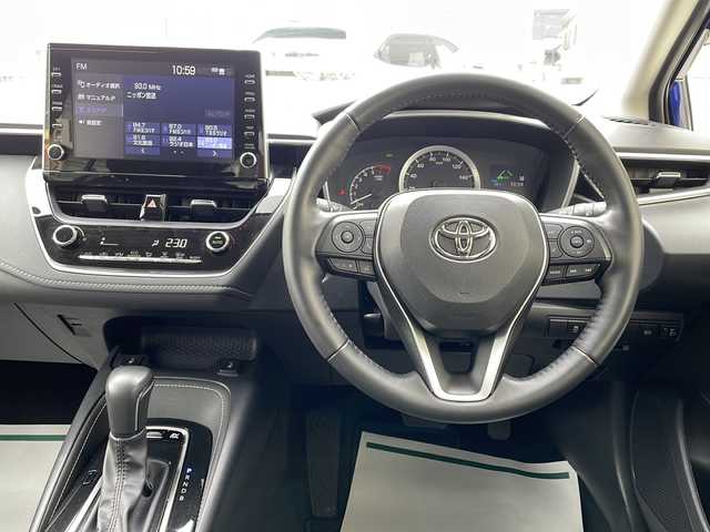 トヨタ カローラツーリング ハイブリッド S 神奈川県 2022(令4)年 1.6万km ライトブルーM 純正ナビ（AM/FM/USB/BT/Miracast)/バックカメラ/前後ドラレコ/ビルトインETC2.0/レーダークルコン/D/N席シートヒーター/ステアリングヒーター/オートハイビーム/ブレーキホールド/ABS/横滑り防止装置/レーンキープアシスト/アイドリングストップ/プッシュスタート/純正AW/純正フロアマット/純正ドアバイザー/保証書/取扱説明書
