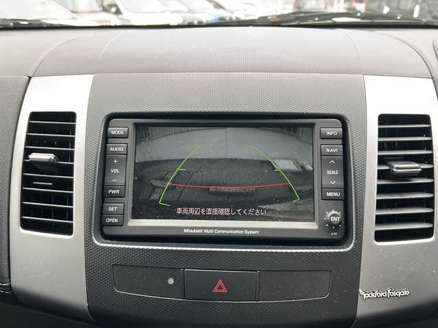 三菱 アウトランダー ROADEST 20G 富山県 2010(平22)年 8.7万km ディープブラックマイカ スマートキー/ハーフレザーシート/３列シート/ロックフォード/メーカーオプションHDDナビ/DVD/MSV/BT/デジタルTV/AUX/USB端子/バックカメラ/ETC/オートリトラミラー/電格ウィンカーミラー/純正フルエアロ/AFS/パドルシフト/ステアリングスイッチ/HIDヘッドライト/フォグ/横滑り防止装置/純正17インチAW/オートライト/保証書・取説・ナビ取説/スペアキー