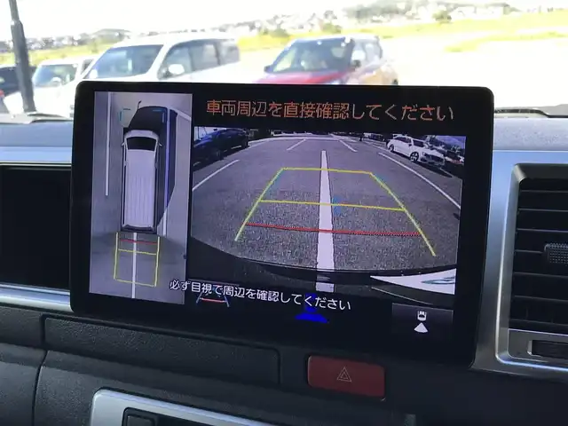 トヨタ ハイエース GL 鳥取県 2021(令3)年 5.8万km ブラックマイカ 社外10インチナビフローティングナビ/(フルセグ/DVD/ブルーレイ/CD/BT）/全方位カメラ・ETC/デジタルインナーミラー/カロッツエリアフリップダウンモニター/FLEXシート（対面/対座/フラットシート）/センターテーブル（脱着可能）/トヨタセーフティセンス/レーンアシスト/前後クリアランスソナー/片側パワースライドドア/LEDヘットライト/フォグランプ/ブラックインナーヘットライト/ローダウン/オートハイビーム/社外18インチアルミホイール/TOYOホワイトレター/社外テールランプ/レザー調シートカバー/プッシュエンジンスタート/スペアキー