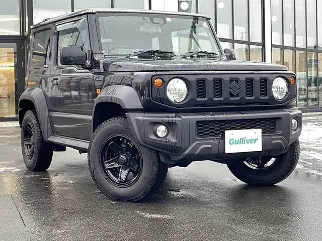スズキ ジムニー シエラ JL 青森県 2023(令5)年 1.7万km ブルーイッシュブラックパール3 ・4WD/・社外フローティングナビ/・BT/フルセグ/・バックカメラ/・デジタルインナーミラー/・前後ドライブレコーダー/・衝突軽減ブレーキ/・レーンキープアシスト/・ダウンヒルアシストコントロール/・プッシュスタート/・スマートキー/・シートヒーター/・スペアキー/・背面タイヤ/・ETC/・夏タイヤAW積込/・純正15AW/・保証書、取説
