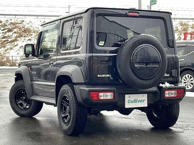 スズキ ジムニー シエラ JL 青森県 2023(令5)年 1.7万km ブルーイッシュブラックパール3 ・4WD/・社外フローティングナビ/・BT/フルセグ/・バックカメラ/・デジタルインナーミラー/・前後ドライブレコーダー/・衝突軽減ブレーキ/・レーンキープアシスト/・ダウンヒルアシストコントロール/・プッシュスタート/・スマートキー/・シートヒーター/・スペアキー/・背面タイヤ/・ETC/・夏タイヤAW積込/・純正15AW/・保証書、取説