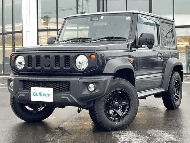 スズキ ジムニー シエラ JL 青森県 2023(令5)年 1.7万km ブルーイッシュブラックパール3 ・4WD/・社外フローティングナビ/・BT/フルセグ/・バックカメラ/・デジタルインナーミラー/・前後ドライブレコーダー/・衝突軽減ブレーキ/・レーンキープアシスト/・ダウンヒルアシストコントロール/・プッシュスタート/・スマートキー/・シートヒーター/・スペアキー/・背面タイヤ/・ETC/・夏タイヤAW積込/・純正15AW/・保証書、取説