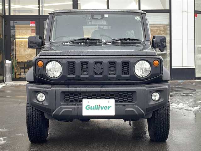 スズキ ジムニー シエラ JL 青森県 2023(令5)年 1.7万km ブルーイッシュブラックパール3 ・4WD/・社外フローティングナビ/・BT/フルセグ/・バックカメラ/・デジタルインナーミラー/・前後ドライブレコーダー/・衝突軽減ブレーキ/・レーンキープアシスト/・ダウンヒルアシストコントロール/・プッシュスタート/・スマートキー/・シートヒーター/・スペアキー/・背面タイヤ/・ETC/・夏タイヤAW積込/・純正15AW/・保証書、取説