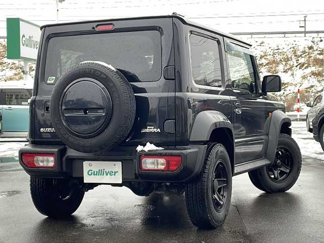 スズキ ジムニー シエラ JL 青森県 2023(令5)年 1.7万km ブルーイッシュブラックパール3 ・4WD/・社外フローティングナビ/・BT/フルセグ/・バックカメラ/・デジタルインナーミラー/・前後ドライブレコーダー/・衝突軽減ブレーキ/・レーンキープアシスト/・ダウンヒルアシストコントロール/・プッシュスタート/・スマートキー/・シートヒーター/・スペアキー/・背面タイヤ/・ETC/・夏タイヤAW積込/・純正15AW/・保証書、取説