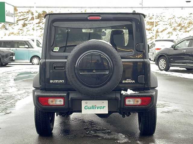 スズキ ジムニー シエラ JL 青森県 2023(令5)年 1.7万km ブルーイッシュブラックパール3 ・4WD/・社外フローティングナビ/・BT/フルセグ/・バックカメラ/・デジタルインナーミラー/・前後ドライブレコーダー/・衝突軽減ブレーキ/・レーンキープアシスト/・ダウンヒルアシストコントロール/・プッシュスタート/・スマートキー/・シートヒーター/・スペアキー/・背面タイヤ/・ETC/・夏タイヤAW積込/・純正15AW/・保証書、取説