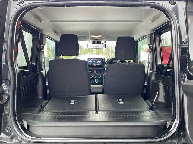 スズキ ジムニー シエラ JL 青森県 2023(令5)年 1.7万km ブルーイッシュブラックパール3 ・4WD/・社外フローティングナビ/・BT/フルセグ/・バックカメラ/・デジタルインナーミラー/・前後ドライブレコーダー/・衝突軽減ブレーキ/・レーンキープアシスト/・ダウンヒルアシストコントロール/・プッシュスタート/・スマートキー/・シートヒーター/・スペアキー/・背面タイヤ/・ETC/・夏タイヤAW積込/・純正15AW/・保証書、取説