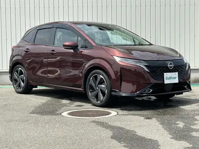 日産 オーラ G FOUR レザーエディション 富山県 2022(令4)年 2.8万km バーガンディー 〇ワンオーナー/〇純正9インチナビ/〇フルセグTV/〇バックカメラ/〇アラウンドビューモニター/〇インテリジェントルームミラー/〇ビルトインETC2.0/〇BOSEサウンドシステム/〇全方位運転支援システム/〇インテリジェントエマージェンシーブレーキ/〇プロパイロット/〇LEDヘッドランプ/〇オートライト/〇フォグランプ/〇純正17インチアルミ/〇革巻きステアリング/〇ステアリングヒーター/〇オートエアコン/〇革シート/〇シートヒーター/〇インテリジェントキー/〇禁煙車