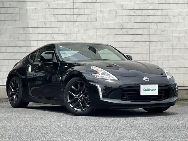 日産 フェアレディ Ｚ 大分県 2015(平27)年 4.8万km ダイヤモンドブラック メーカーHDDナビ 【フルセグ/DVD】/バックカメラ/純正18インチアルミホイール/ドライブレコーダー/ビルトインETC/HIDヘッドライト/オートライト/リアフォグランプ/レザーステアリング/パドルシフト/チルトステアリング/横滑り防止装置/運転席シートリフター/エンジンプッシュスタート/フロアマット/電動格納ミラー/サイド&Wエアバッグ/ABS/スマートキー×2/車両取説