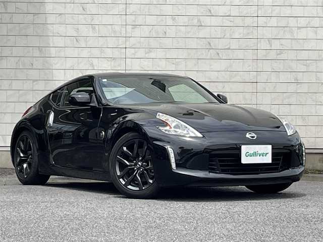 日産 フェアレディ Ｚ 大分県 2015(平27)年 4.8万km ダイヤモンドブラック メーカーHDDナビ 【フルセグ/DVD】/バックカメラ/純正18インチアルミホイール/ドライブレコーダー/ビルトインETC/HIDヘッドライト/オートライト/リアフォグランプ/レザーステアリング/パドルシフト/チルトステアリング/横滑り防止装置/運転席シートリフター/エンジンプッシュスタート/フロアマット/電動格納ミラー/サイド&Wエアバッグ/ABS/スマートキー×2/車両取説
