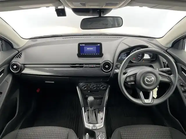マツダ デミオ 15S 富山県 2019(令1)年 5.2万km ソウルレッドクリスタルM 純正ナビ（AM/FM/BT/DVD/USB/ワンセグ）/バックカメラ/ドライブレコーダー/ETC/ブラインドスポットモニター/衝突被害軽減システム/レーンキープアシスト/コーナーセンサー/横滑り防止装置/アイドリングストップ/純正フロアマット/オートハロゲンライト/ステアリングスイッチ/スマートキー