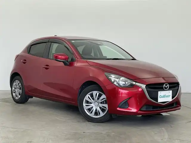 マツダ デミオ 15S 富山県 2019(令1)年 5.2万km ソウルレッドクリスタルM 純正ナビ（AM/FM/BT/DVD/USB/ワンセグ）/バックカメラ/ドライブレコーダー/ETC/ブラインドスポットモニター/衝突被害軽減システム/レーンキープアシスト/コーナーセンサー/横滑り防止装置/アイドリングストップ/純正フロアマット/オートハロゲンライト/ステアリングスイッチ/スマートキー