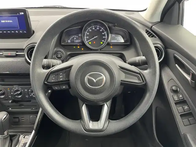 マツダ デミオ 15S 富山県 2019(令1)年 5.2万km ソウルレッドクリスタルM 純正ナビ（AM/FM/BT/DVD/USB/ワンセグ）/バックカメラ/ドライブレコーダー/ETC/ブラインドスポットモニター/衝突被害軽減システム/レーンキープアシスト/コーナーセンサー/横滑り防止装置/アイドリングストップ/純正フロアマット/オートハロゲンライト/ステアリングスイッチ/スマートキー