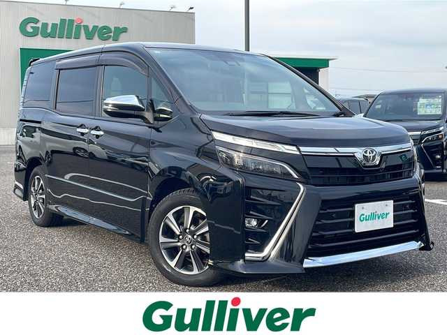 トヨタ ヴォクシー ZS 煌Ⅲ 島根県 2021(令3)年 4.3万km ブラック 社外ナビ（AVN-P10W）/Bluetooth/AM/FM/CD/DVD/ETC/バックカメラ/フリップダウンモニター/→10.1インチ（ALPINE）リモコンあり/アイドリングストップ/ウィンカーミラー/キャプテンシート/クルーズコントロール/ドアバイザー/プッシュスタート/両側パワースライドドア/横滑り防止装置/ASB/外部入力（AUX）/オートマチックハイビーム/SD/衝突軽減/スペアキー/トランパスタイヤ
