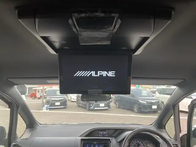 トヨタ ヴォクシー ZS 煌Ⅲ 島根県 2021(令3)年 4.3万km ブラック 社外ナビ（AVN-P10W）/Bluetooth/AM/FM/CD/DVD/ETC/バックカメラ/フリップダウンモニター/→10.1インチ（ALPINE）リモコンあり/アイドリングストップ/ウィンカーミラー/キャプテンシート/クルーズコントロール/ドアバイザー/プッシュスタート/両側パワースライドドア/横滑り防止装置/ASB/外部入力（AUX）/オートマチックハイビーム/SD/衝突軽減/スペアキー/トランパスタイヤ