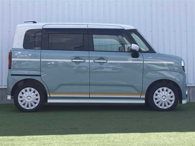 スズキ ワゴンＲ スマイル HYBRID X 香川県 2024(令6)年 0.2万km オフブルーメタリック/ホワイト2トーン 登録時走行距離：1441km/メーカー純正ナビ/　CD DVD BT フルセグTV/全方位カメラ/両側パワースライドドア/衝突被害軽減/レーンキープアシスト/クリアランスソナー/LEDヘッドライト/オートライト/フォグランプ/シートヒーター/ISOFIX/プッシュスタート/スマートキー/新車時保証書/ワンーオーナー