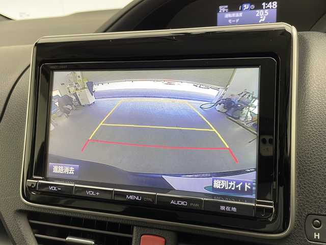 トヨタ ヴォクシー ハイブリッド X 宮崎県 2015(平27)年 7.7万km ブラック 禁煙車/純正9型ナビTV/（NSZT-Y64T/CD/DVD/Bluetooth/フルセグTV）/純正バックカメラ/純正ビルトインETC/純正LEDオートライト/純正フォグ/純正15インチアルミ/純正フロアマット/両側電動スライドドア/デュアルオートエアコン/ウインカードアミラー/スマートキー/プッシュエンジンスタート/スペアキー/新車時保証書/取扱い説明書