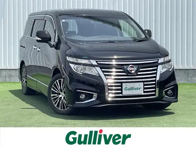日産 エルグランド 250ハイウェイスターS 香川県 2016(平28)年 6.5万km ファントムブラック 登録時走行距離 64429km/純正8インチナビ/→AM/FM/フルセグTV/Bluetooth/バックカメラ/クルーズコントロール/ビルトインETC/純正11インチフリップダウンモニター/ハーフレザーシート/オットマン/キャプテンシート/両側パワースライドドア/LEDオートライト/フォグランプ/プッシュスタート/スマートキー