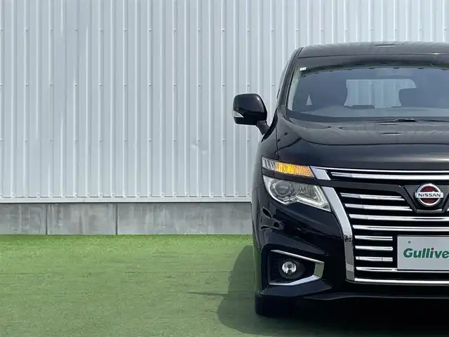 日産 エルグランド 250ハイウェイスターS 香川県 2016(平28)年 6.5万km ファントムブラック 登録時走行距離 64429km/純正8インチナビ/→AM/FM/フルセグTV/Bluetooth/バックカメラ/クルーズコントロール/ビルトインETC/純正11インチフリップダウンモニター/ハーフレザーシート/オットマン/キャプテンシート/両側パワースライドドア/LEDオートライト/フォグランプ/プッシュスタート/スマートキー