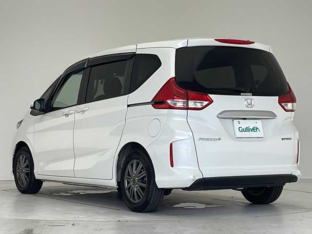 ホンダ フリード＋ ハイブリット G 愛知県 2022(令4)年 2.5万km プラチナホワイトパール 衝突軽減システム/純正9型ナビ/フリップダウンモニター/両側パワースライドドア/クルーズコントロール/シートヒーター/フルセグ/CD DVD/Bluetooth/バックカメラ/コーナーセンサー/アルミホイール/LEDヘッドライト/オートライト/ドライブレコーダー/ETC/ステアリングスイッチ/スマートキー/プッシュスタート