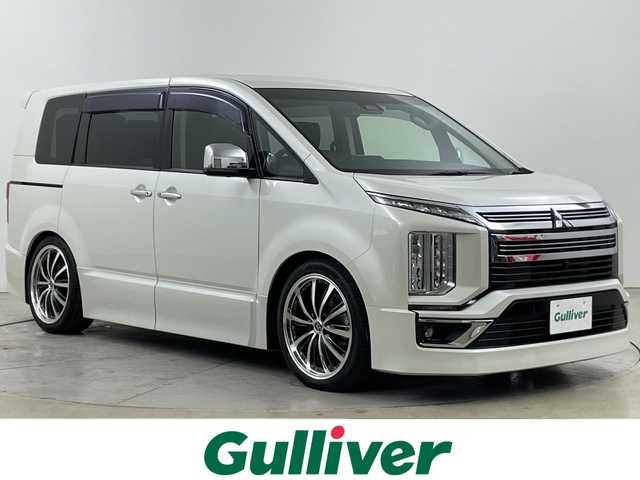 三菱 デリカＤ：５ アーバンギア G パワーパッケージ 道央・札幌 2019(令1)年 2.9万km ウォームホワイトパール 禁煙車/社外ナビ/（CD/DVD/BT/フルセグTV/FM/AM）/衝突被害軽減ブレーキ/車線逸脱警報/アダプティブクルーズコントロール/全方位カメラ/ETC/ドライブレコーダー/両側パワースライドドア/ブラインドスポットモニター/D席パワーシート/前席シートヒーター/パドルシフト/オートステップ/パワーバックドア/電動パーキングブレーキ/オートブレーキホールド/BLITZ車高調/社外フロアマット/社外20インチAW/純正サスペンション積込