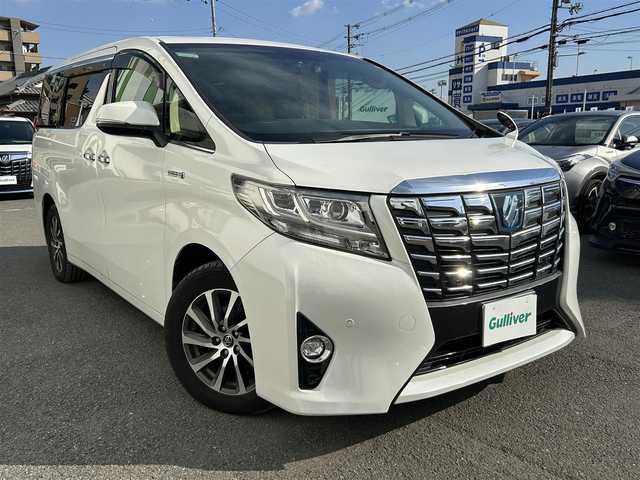 トヨタ アルファードハイブリット G Fパッケージ 秋田県 2016(平28)年 5.7万km ホワイトパールクリスタルシャイン 社外ナビ/アルパインナビ/衝突軽減/両側電動/後席モニター/バックカメラ/ＥＴＣ/シートヒーター/ドライブレコーダー/レーダークルコン/革シート/ＬＥＤヘッドライト/電動リアゲート/プッシュスタート/オートライト/オートエアコン/電動ミラー/ハンドルヒーター/フォグランプ/純正アルミホイール/リアオートエアコン
