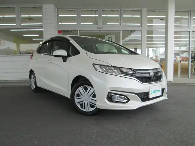 ホンダ フィット 13G L ホンダセンシング 千葉県 2017(平29)年 1万km プレミアムホワイトパールⅡ ワンオーナー/純正ナビ/フルセグTV/バックカメラ/ETC/クルーズコントロール/アイドリングストップ/ドライブレコーダー/スマートキー/スペアキー×1/純正フロアマット/取扱説明書/保証書