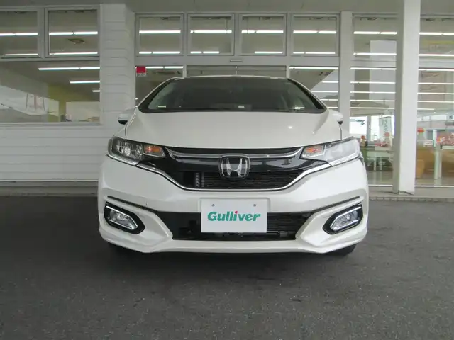 ホンダ フィット 13G L ホンダセンシング 千葉県 2017(平29)年 1万km プレミアムホワイトパールⅡ ワンオーナー/純正ナビ/フルセグTV/バックカメラ/ETC/クルーズコントロール/アイドリングストップ/ドライブレコーダー/スマートキー/スペアキー×1/純正フロアマット/取扱説明書/保証書