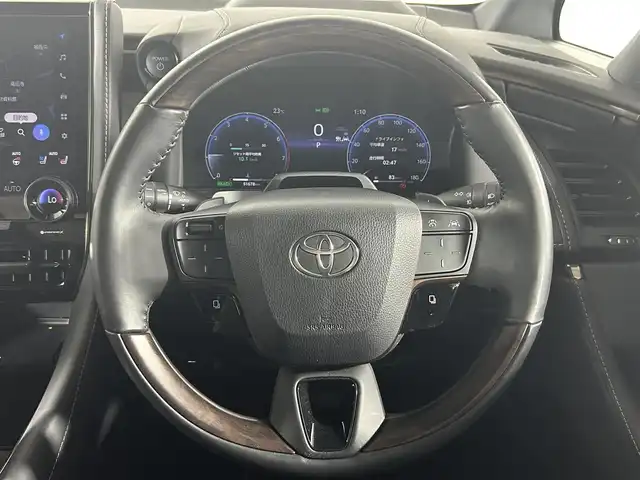 トヨタ アルファードハイブリット Z 佐賀県 2023(令5)年 5.2万km プラチナホワイトパールマイカ 純正14インチディスプレイオーディオplus/後席フリップダウンモニター/デジタルインナーミラー/左右独立ムーンルーフ/ヘッドアップディスプレイ/トヨタチームメイト/アドバンスドパーク/寒冷地仕様/パノラミックビューモニター/合皮シート/シートベンチレーション/ブラインドスポットモニター/コーナーセンサー/ワイヤレス充電/全席パワーシート/オットマン/電動リアゲート/純正18インチアルミホイール