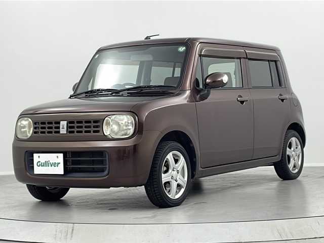 スズキ ラパン X 福島県 2009(平21)年 7.7万km マルーンブラウンパール /プッシュスタート//電動格納ミラー//純正アルミホイール積込//保証書//取扱説明書//パワーウィンドウ//純正フロアマット//ドアバイザー//純正オーディオ