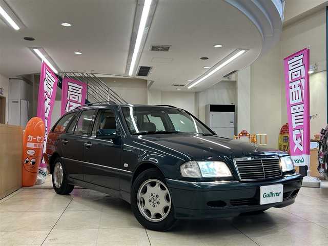 メルセデス・ベンツ Ｃ２４０ ステーションワゴン 東京都 1998(平10)年 17.4万km ブライトグリーン ・社外ポータブルナビ/・革シート/・サンルーフ/・木目調パネル/・純正ホイール/・純正マット/・社外オーディオ（carrozeria)/・ETC/・クルーズコントロール/・シートヒーター/・パワーシート/・電動格納ミラー/・ルーフレール/・トノカバー/・HID/・フォグランプ/・ヘッドライトレベライザー/・スペアタイヤ