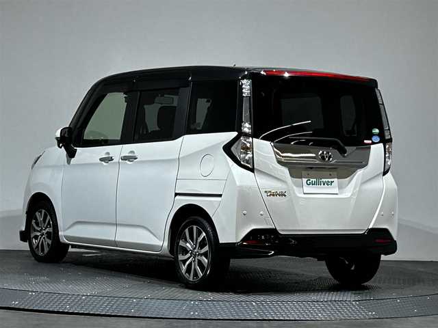 トヨタ タンク カスタムG－T 愛媛県 2019(令1)年 4.4万km ブラックマイカメタリック/パールホワイト2トーン ・７型社外ナビ（フルセグＴＶ・ＢＴ・ＦＭＡＭ・ＳＤ）/・バックカメラ　/・ＥＴＣ　/・両側パワースライドドア　/・クルーズコントロール　/・衝突軽減ブレーキ　/・オートマチックハイビーム　/・前方ドラレコ　/・横滑り防止/・アイドリングストップ/・コーナーセンサー/・ステアリングリモコン/・LEDヘッドライト/・DN席シートヒーター