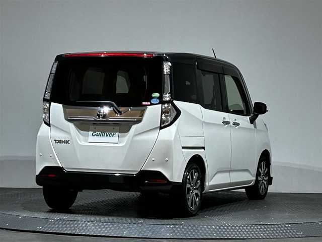 トヨタ タンク カスタムG－T 愛媛県 2019(令1)年 4.4万km ブラックマイカメタリック/パールホワイト2トーン スマートアシスト３/・衝突回避支援ブレーキ機能/・衝突警報機能/・車線逸脱警報機能/・誤発信抑制制御機能/・先行車発進お知らせ機能/・オートハイビーム/７インチSDナビ/（フルセグＴＶ・ＢＴ・ＦＭＡＭ・ＳＤ）/バックカメラ　/ＥＴＣ　/両側パワースライドドア　/クルーズコントロール　/DN席シートヒーター/前方ドラレコ　/横滑り防止/アイドリングストップ/コーナーセンサー/ステアリングリモコン/LEDヘッドライト