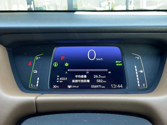 ホンダ フィット e:HEVリュクス 長野県 2021(令3)年 5.7万km プレミアムクリスタルレッドM 純正9インチメモリナビ/(VXU-215Fi)/フルセグTV/CD/DVD/バックカメラ/USB入力端子/Bluetooth接続/純正16インチアルミホイール/社外AW付スタッドレス車載/クルーズコントロール　/ステアリングスイッチ　/ステアリングヒーター　/ＬＥＤヘッドライト　/衝突軽減システム/コーナーセンサー/ハンドルヒーター/ウインカーミラー/ワイヤレス充電/ミラーヒーター/オートライト/横滑り防止　/盗難防止　/ＥＴＣ