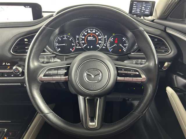 マツダ ＣＸ－３０ 佐賀県 2020(令2)年 8.7万km スノーフレイクホワイトパールマイカ 純正１０．２５インチナビ/（フルセグTV/CD/DVD/Bluetooth/USB/HDMI）/衝突被害軽減システム/ＢＯＺＥプレミアムサウンド/全方位カメラ/前後ドライブレコーダー/追従型クルーズコントロール/運転席パワーシート/レザーシート/シートヒーター/コーナーセンサー/ハンドルヒーター/ヘッドアップディスプレイ/パワーバックドア/シートポジションメモリ/レーダー/横滑り防止装置/盗難防止装置