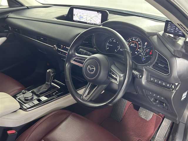 マツダ ＣＸ－３０ 佐賀県 2020(令2)年 8.7万km スノーフレイクホワイトパールマイカ 純正１０．２５インチナビ/（フルセグTV/CD/DVD/Bluetooth/USB/HDMI）/衝突被害軽減システム/ＢＯＺＥプレミアムサウンド/全方位カメラ/前後ドライブレコーダー/追従型クルーズコントロール/運転席パワーシート/レザーシート/シートヒーター/コーナーセンサー/ハンドルヒーター/ヘッドアップディスプレイ/パワーバックドア/シートポジションメモリ/レーダー/横滑り防止装置/盗難防止装置