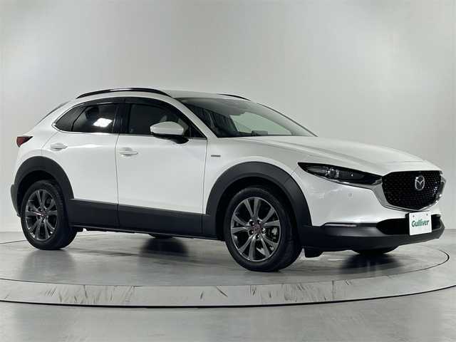 マツダ ＣＸ－３０ 佐賀県 2020(令2)年 8.7万km スノーフレイクホワイトパールマイカ 純正１０．２５インチナビ/（フルセグTV/CD/DVD/Bluetooth/USB/HDMI）/衝突被害軽減システム/ＢＯＺＥプレミアムサウンド/全方位カメラ/前後ドライブレコーダー/追従型クルーズコントロール/運転席パワーシート/レザーシート/シートヒーター/コーナーセンサー/ハンドルヒーター/ヘッドアップディスプレイ/パワーバックドア/シートポジションメモリ/レーダー/横滑り防止装置/盗難防止装置