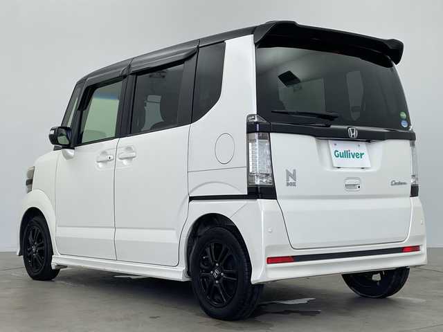 ホンダ Ｎ ＢＯＸ カスタム G SSパッケージ 鹿児島県 2014(平26)年 11.1万km プレミアムホワイトパール 純正メモリナビ/（AM/FM/CD/DVD/ワンセグ）/バックカメラ/両側パワースライドドア/前後ドライブレコーダー/CTBA/ETC/革調シートカバー/純正AW14インチ/純正フロアマット/パワーウインドウ/パワーステアリング/スマートキー/スペアキー