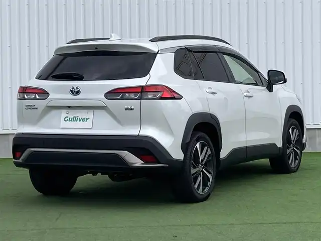 トヨタ カローラ クロス ハイブリッド Z 香川県 2023(令5)年 3.3万km プラチナホワイトパールマイカ トヨタセーフティーセンス/・プリクラッシュ/・ＬＴＡ/純正9インチナビ/バックカメラ/ハーフレザーシート/シートヒーター/パワーシート/パワーバックドア/革巻きステアリング/ステアリングリモコン/レーダークルーズ/ＢＳＭ/ＬＥＤライト/ＡＣ１００Ｖ/スマートキー