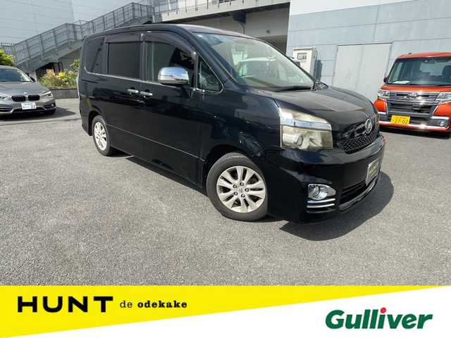 トヨタ ヴォクシー ZS 千葉県 2010(平22)年 10.4万km ブラック ユーザー買取車両/社外ナビ(AVN-LS01W)/・フルセグ/BT/DVD/CD/両側パワースライドドア/ETC/純正フロアマット/純正16インチAW