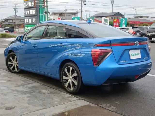 トヨタ ＭＩＲＡＩ 静岡県 2016(平28)年 3.4万km ピュアブルーメタリック 2トーン 水素自動車/法人ワンオーナー／禁煙車/車検R9年2月25日/トヨタセーフティセンス/　・プリクラッシュセーフティ/　・レーダークルーズコントロール/　・レーンキープシスト/　・オートマチックハイビーム/BSM/クリアランスソナー／バックソナー/純正9インチSDナビ（DSZT-YB4Y）/　CD/DVD/SD/BT/USB/VTR/フルセグTV/バックカメラ/ビルトインETC/前方ドライブレコーダー（DC-DR410）/置くだけ充電/前席パワーシート／運転席シートメモリー/前席シートヒーター/プッシュスタート／スマートキー/LEDヘッドライト/取扱説明書／保証書/純正フロアマット／ドアバイザー
