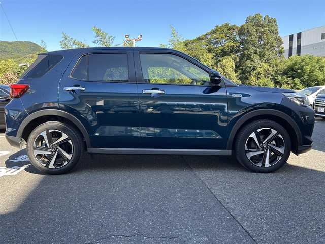 ダイハツ ロッキー プレミアム G HEV 長崎県 2022(令4)年 3.2万km レーザーブルークリスタルシャイン ・純正SDナビ（AM/FM/BT/CD/DVD/フルセグTV）/・スマートアシスト/・フロアマット/・BSM/・電子サイドブレーキ/・全方位モニター/・RCTA/・S-PDL/・ステアリングスイッチ/・ビルトインETC/・電格ウィンカーミラー/・追従クルーズコントロール/・前方ドライブレコーダー/・前席シートヒーター/・革調シートカバー