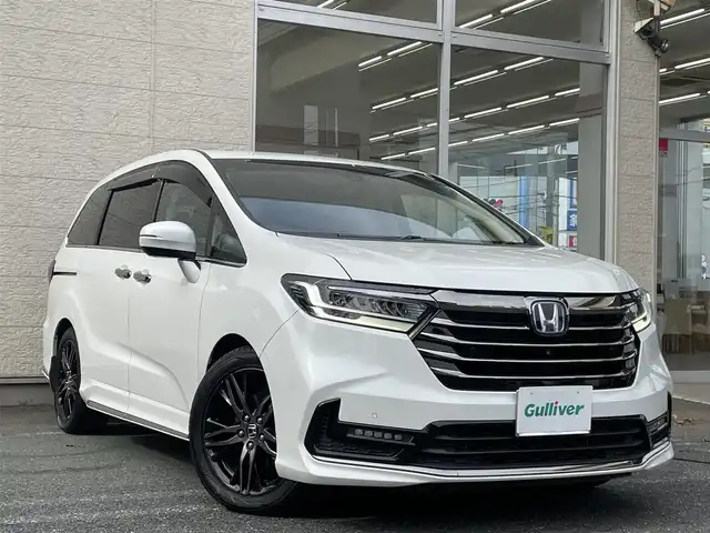 ホンダ オデッセイ ハイブリッド e:HEVアブソルート EX 埼玉県 2021(令3)年 3.9万km プラチナホワイトパール /ワンオーナー//純正10型メモリナビ//フルセグTV//全方位カメラ//フリップダウンモニター//CD/DVD/Bluetooth//両側パワースライドドア//パワーバックドア//アダプティブクルーズコントロール//ビルトインETC2.0//スマートキーx2//LEDヘッドライト/LEDフォグ//前2席パワーシート&シートヒータ//2ndシート オットマン//ハーフレザーシート//CMBS 衝突軽減ブレーキ//LKAS 車線維持支援システム//ブラインドスポットインフォメーション//W.サイド.カーテンエアバッグ//ABS/横滑り防止装置//アドバンスドルームミラー//オートライト//革巻きステアリング//プライバシーガラス//ドアバイザー//純正18インチAW//新車時保証書//取扱説明書//ナビ取説