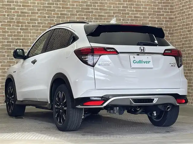 ホンダ ヴェゼル ハイブリッド モデューロ X ホンダセンシング 岩手県 2021(令3)年 3.3万km プラチナホワイトパール ワンオーナー/４WD/専用グリル・エアロバンパー/専用サスペンション/専用スポーティシート/ホンダセンシング/衝突軽減ブレーキ/路外逸脱抑制機能/アダプティブクルーズコントロール/車線維持支援機能/標識認識機能/先行車発信お知らせ機能/誤発進抑制機能/横滑り防止装置/シートヒーター/ワイパーデアイサー/純正ナビ/フルセグTV/ステアリングスイッチ/バックカメラ/ドライブレコーダー/ETC/LEDヘッドライト/LEDフォグライト/純正１７インチアルミホイール