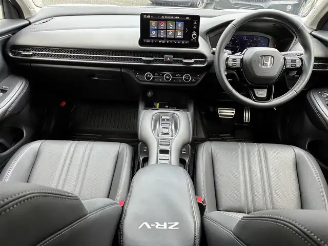 ホンダ ＺＲ－Ｖ ハイブリッド e:HEV Z 熊本県 2024(令6)年 1.3万km プラチナホワイトパール BOSEサウンド/純正ナビ/【フルセグTV/Bluetooth/USB/ラジオ】/全方位カメラ/レーダークルーズコントロール/パドルシフト/衝突軽減ブレーキ/レーンキープアシスト/先行車発進お知らせ機能/パーキングセンサー/ダウンヒルアシスト/標識認識機能/黒革シート/前席パワーシート/運転席シートメモリ/前席シートヒーター/ビルトインETC2.0/前後ドライブレコーダー（DRH-224SD）/横滑り防止機能/ブレーキホールド/純正18インチAW/ワイヤレス充電/ステアリングヒーター/革巻きステアリング/ステアリングスイッチ/オートライト/LEDヘッドライト/純正フロアマット/ドアバイザー/保証書/取扱説明書